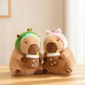 brown capybara plush toy sitting and holding a bubble tea cup