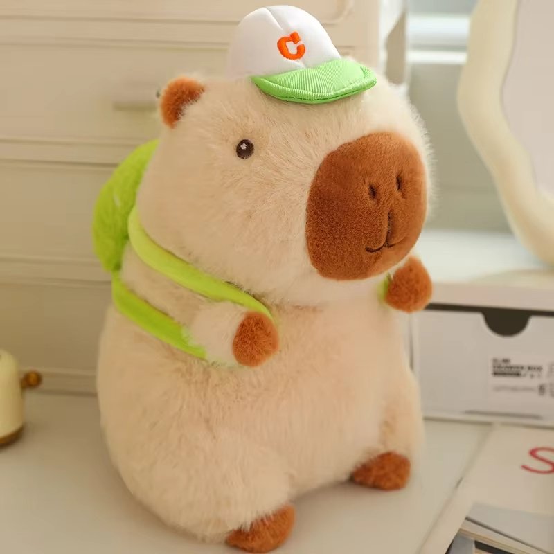 brown capybara plush toy with baseball cap