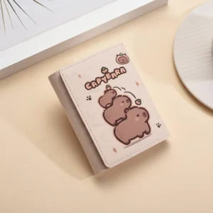 A wobbly tower of three capybaras balancing oranges on their heads.