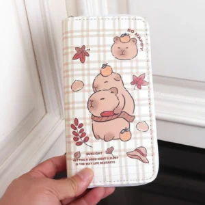 A warm, checkered pattern showing capybaras stacking up with autumn leaves and oranges.