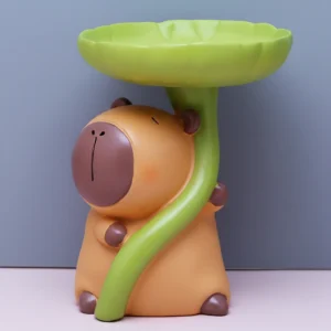 Capybara Holding Leaf Tray