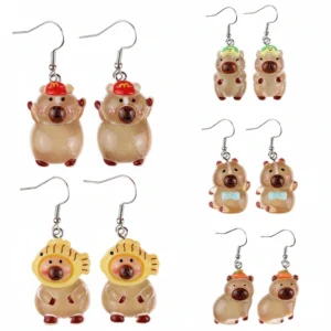 Five styles of capybara dangle ear hooks shown in both regular solid colors and a glowing green luminous version for nighttime wear.