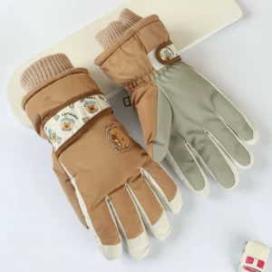 Adult windproof winter cycling gloves in beige and khaki, displaying a textured non-slip palm and a decorative wrist strap featuring a capybara drinking bubble tea.