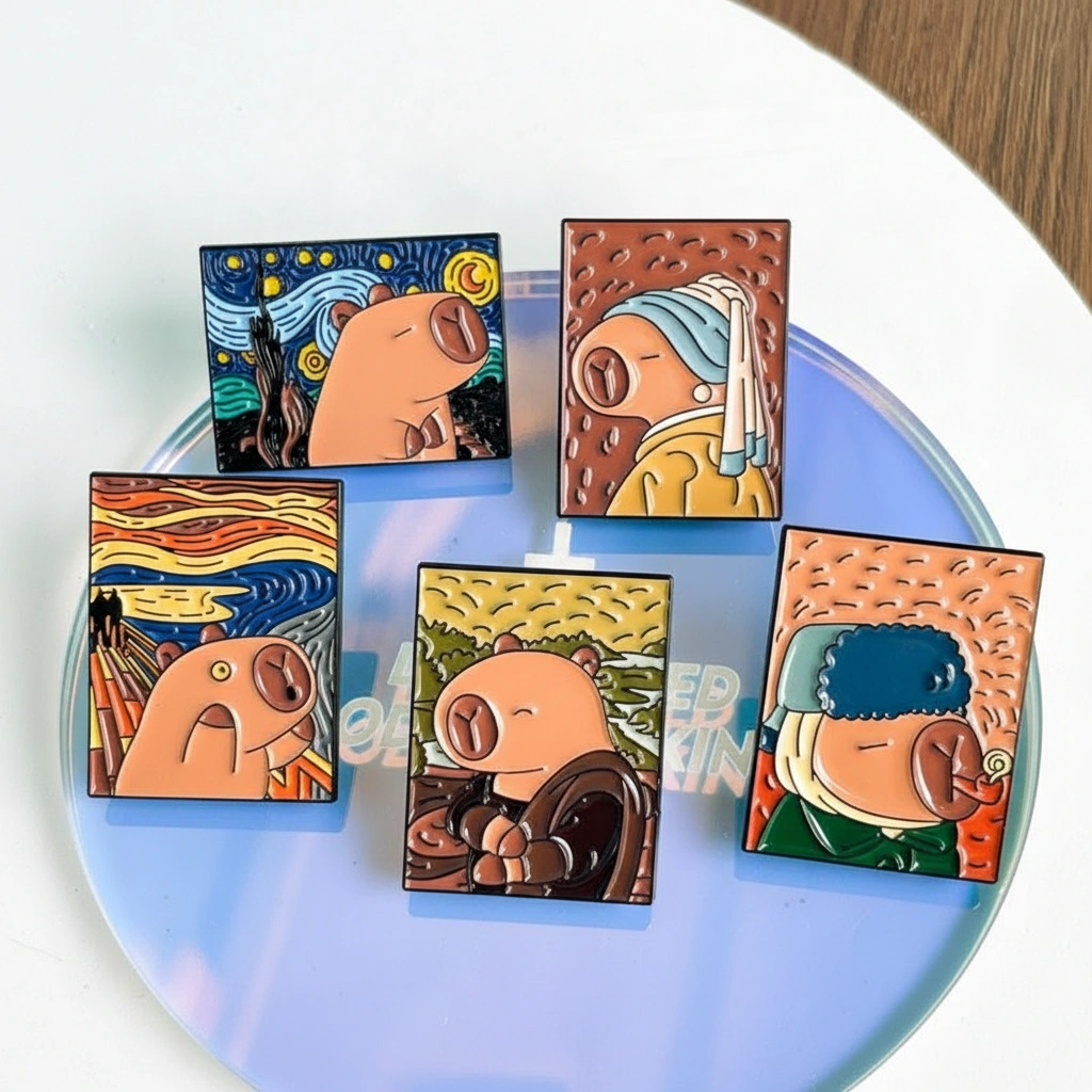 Set of five rectangular enamel pins featuring cartoon capybaras parodying famous paintings including The Starry Night, The Scream, Mona Lisa, Girl with a Pearl Earring, and Van Gogh's Self-Portrait.
