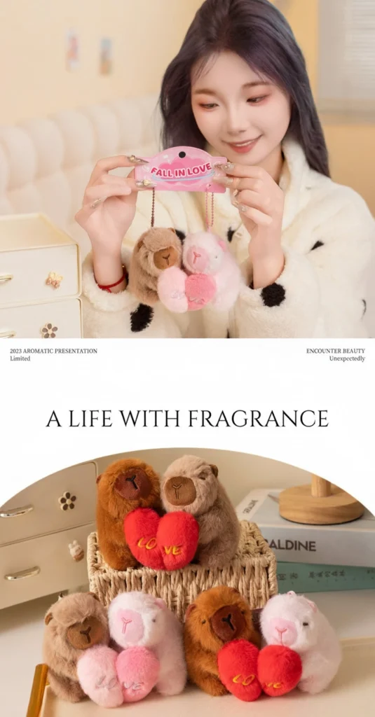 Hands holding a packaging card labeled "Fall In Love" with two magnetic capybara keychains hanging from it.