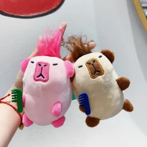 A hand holding a pink capybara plushie, showing the hair braided into a single upright ponytail.