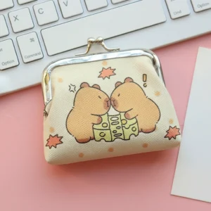 Mini coin purse with a silver metal kiss-lock clasp, featuring a cartoon print of capybaras inside Mahjong tiles.